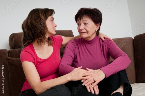 Photo: Big problems - daughter comforts senior mother Big problems - daughter comforts senior mother