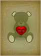 Teddy bear with heart on vintage background