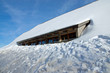 House covered by snow House covered by snow