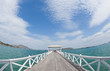 Curve of long wooden bridge