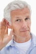 Portrait of a man giving his ear