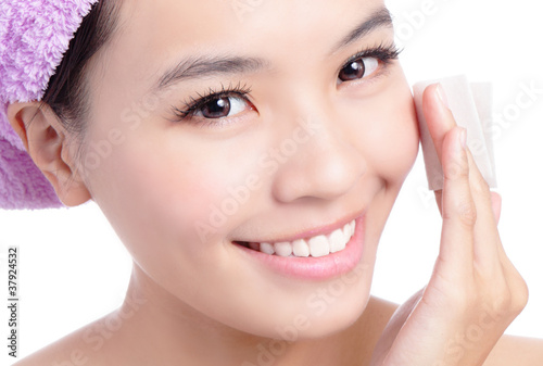 Photo: Young Beautiful Girl remove makeup by Cleansing Cotton Young Beautiful Girl remove makeup by Cleansing Cotton