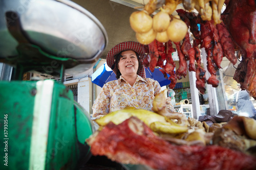 Photo: Portrait of Asian woman selling street food in Cambodia Portrait of Asian woman selling street food in Cambodia