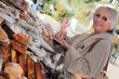 Woman buying bread from market stall