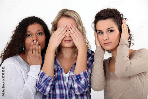 Photo: Young women witnessing destruction Young women witnessing destruction