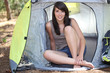 woman sat in tent
