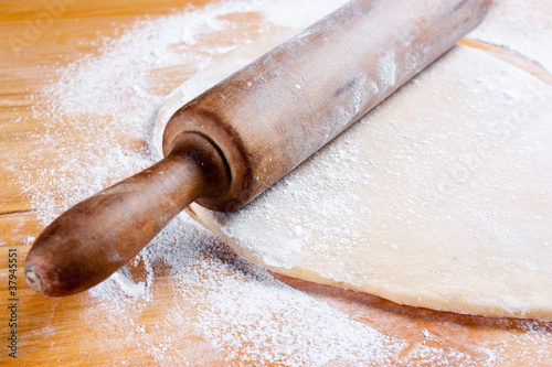 Photo: stretched dough with a rolling stretched dough with a rolling