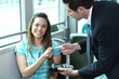 A young female passenger showing her card