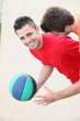 Young men playing handball