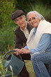 elderly couple gardening