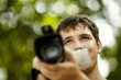 young man with camcorder