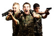 three soldiers aiming with their guns