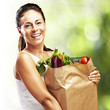 Photo: woman with a groceries bag woman with a groceries bag