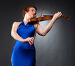 violinist in blue evening gown violinist in blue evening gown