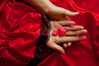 two hearts  on the couple hands