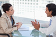 Photo: Young business people negotiating Young business people negotiating