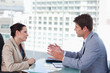 Photo: Young business team negotiating Young business team negotiating