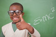 Schoolboy posing with the the mass-energy equivalence formula an