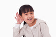 Foto: Girl pricking up her ear Girl pricking up her ear
