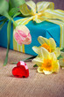 Valentine's day concept: red heart with gift box and flowers