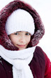 Winter portrait of the girl in the street