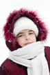 Winter portrait of the girl in the street