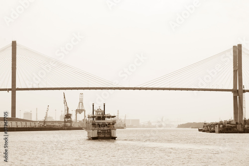 Photo: Riverboat coming under Talmadge Memorial Bridge in Savannah Riverboat coming under Talmadge Memorial Bridge in Savannah