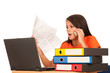 Attractive young brunette working on laptop