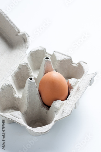Photo: Egg box with one egg in Egg box with one egg in