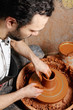 Photo: Potter at work above view Potter at work above view