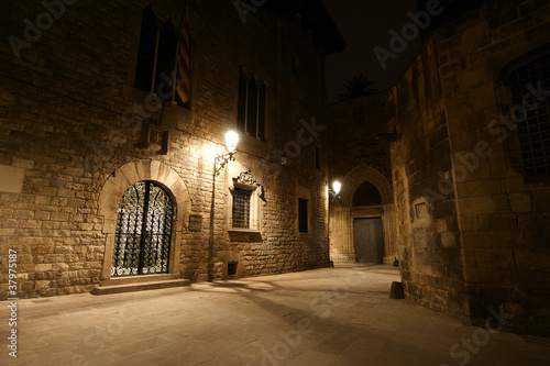 Photo: Gothic quarter at night. Empty alleyways in Barcelona Gothic quarter at night. Empty alleyways in Barcelona