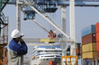 dock worker, containers, ships and cranes