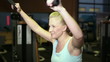 Happy woman doing circuit training