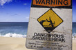 Warning - Dangerous Shore Break sign at public beach Warning - Dangerous Shore Break sign at public beach