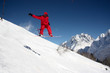 Snowboarder Flying In The Mountains