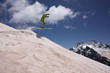 Flight skier in the mountains