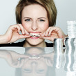 Photo: Pretty woman wants to have more silver coins Pretty woman wants to have more silver coins
