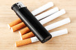 Stack of cigarette with the lighter