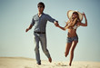Young couple running