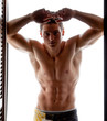 Foto: The muscular young naked sexy man leaned against the wall The muscular young naked sexy man leaned against the wall