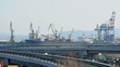 Commercial port cranes. Cranes in a port