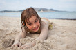 little girl on sandy beach little girl on sandy beach