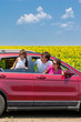 Family vacation. Parents with child in car trip