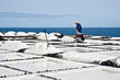Foto: Worker at salt extraction La Palma Worker at salt extraction La Palma