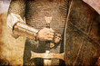 Photo of Knight and sword. Photo in old image style. Photo of Knight and sword. Photo in old image style.