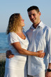 Happy young couple at beach