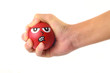 Hand mit Stressball rot