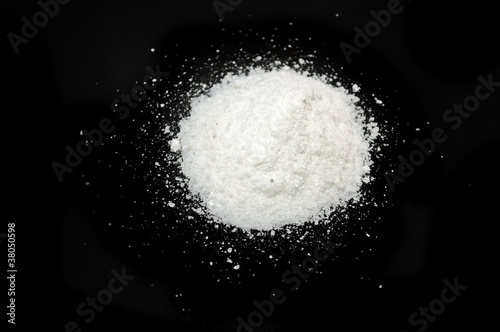 Photo: Pile of Sea Salt on Black Background Pile of Sea Salt on Black Background