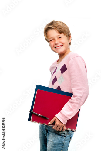 Photo: Portrait of young student holding notebooks Portrait of young student holding notebooks