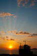 Sunset and tower crane Sunset and tower crane
